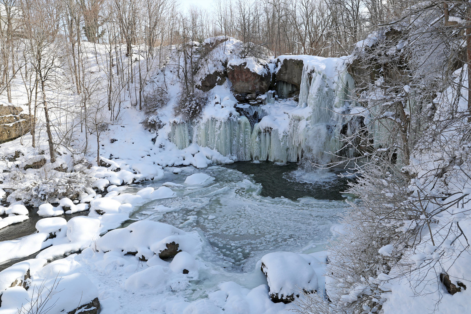 Ice forms on the the 40-foot waterfall on Murder Creek in Akron Falls Park